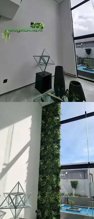 Compact counter-side foliage panel: A slim vertical foliage panel adds greenery to the side of a contemporary indoor counter.